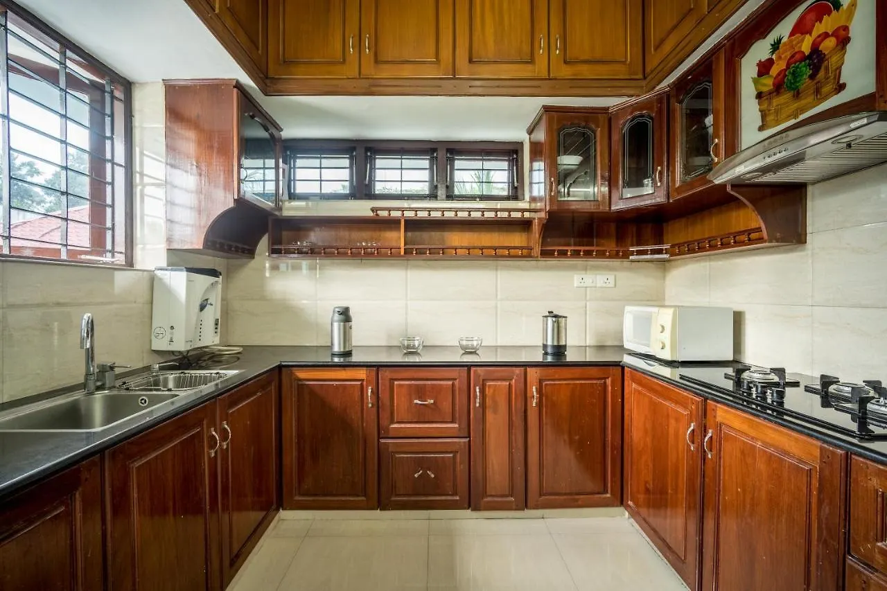 Anies Garden Apartamento Thiruvananthapuram Quarto em Acomodações Particulares